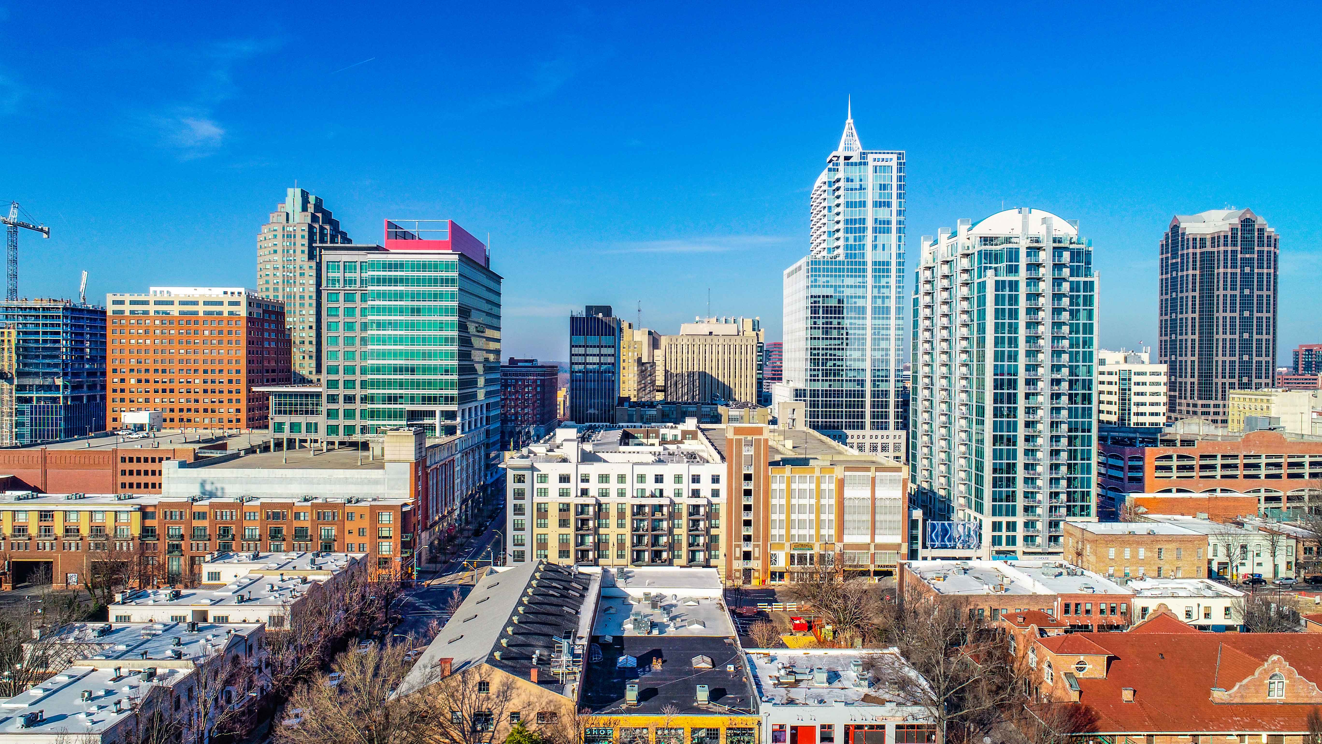 raleigh-downtown-skyline-blue-sky