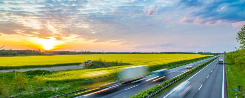 Highway with blurred trucks