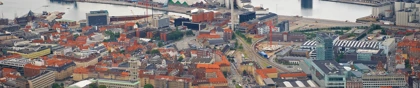 Panoramic view of Aarhus, Denmark, showing the city center, industrial harbor, and shipping cranes by the waterfront