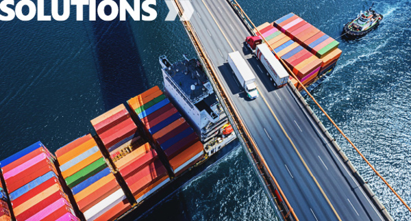 multimodal-logistics-container-ship-trucks-bridge